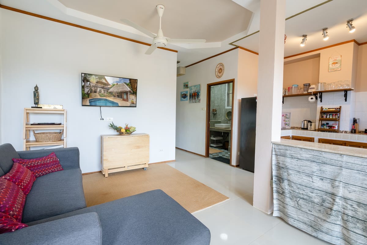 lounge with foldaway dining table — Ground floor of Villa Ayutthaya, private pool villa in Koh Lanta