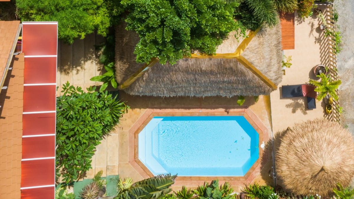 aerial view of the pool and thatched sala — Outdoor area of Villa Ayutthaya, private pool villa in Koh Lanta