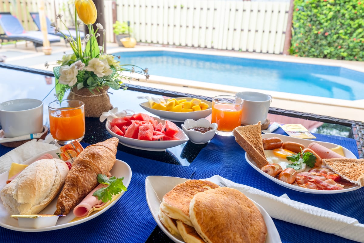 breakfast by the Pool — Outdoor area of Villa Ayutthaya, private pool villa in Koh Lanta
