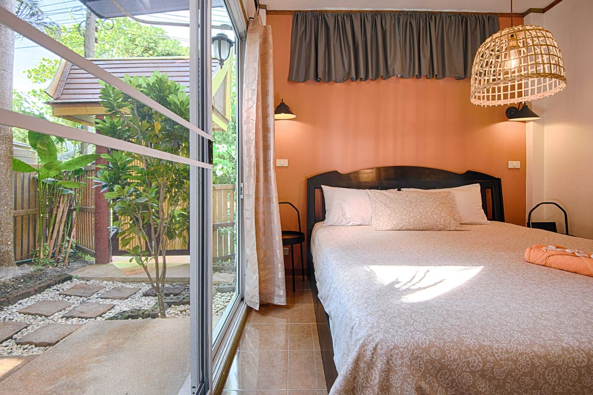 bedroom and outdoor view — 1st floor of Villa Siam Lanna, private pool villa in Koh Lanta