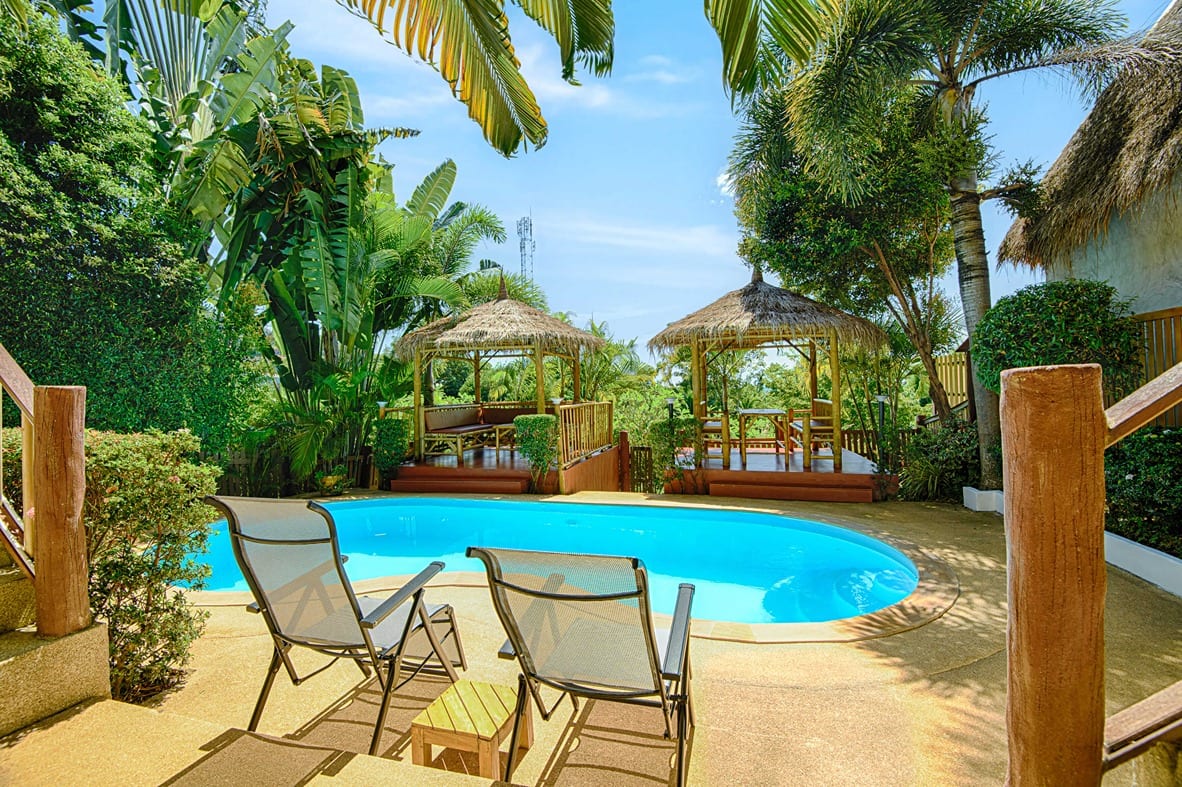 sala view from lounge chairs — Outdoor area of Villa Siam Lanna, private pool villa in Koh Lanta